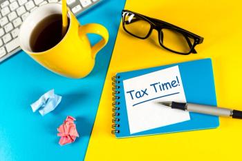 tax time note, coffee cup, desk