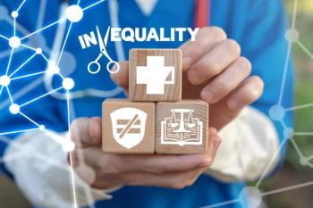 doctor holding symbols of racial inequality ©wladimir1804-stock.adobe.com