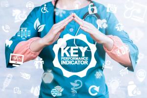 Doctor cupping hands over words key performance indicator ©wladimir1804-stock.adobe.com