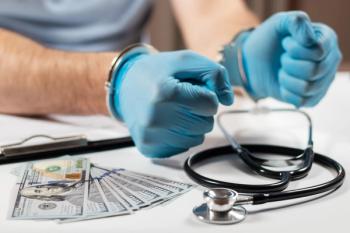physician doctor handcuffs money stethoscope: © eliosdnepr - stock.adobe.com