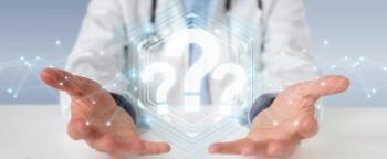 doctor holding question marks