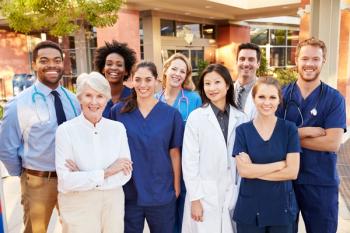 Medical staff standing outside hospital ©Monkey Business-stock.adobe.com