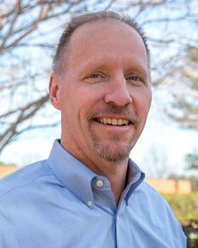 Headshot of Conrad L. Flick, MD (credit: Family Physician Network) 