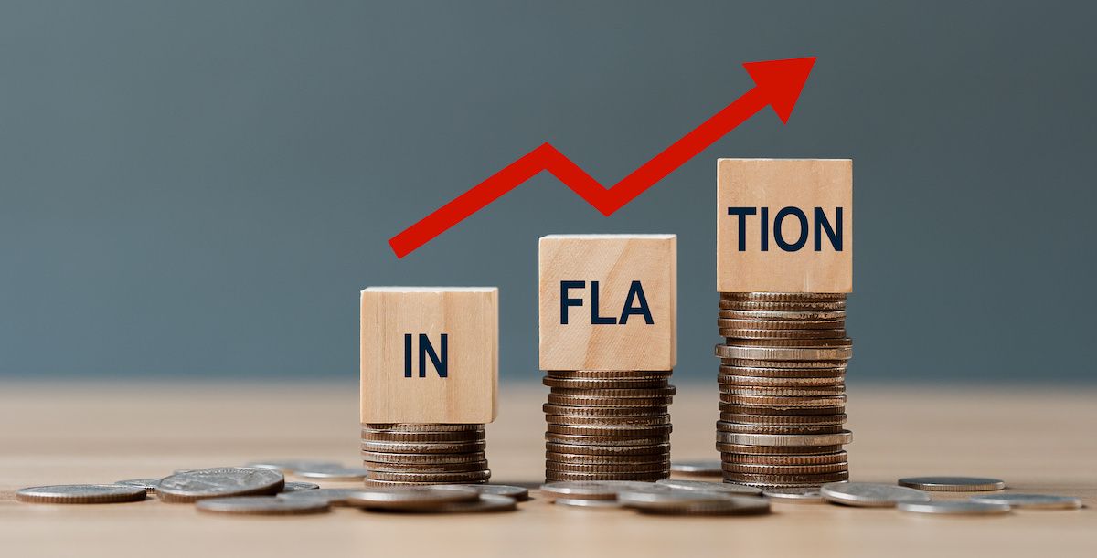 inflation word on wooden cube on coins: © Deemerwha studio stock.adobe.com