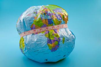 Obese world measuring tape around world
