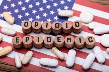 opioid epidemic pills over flag: © Andrey Popov stock.adobe.com