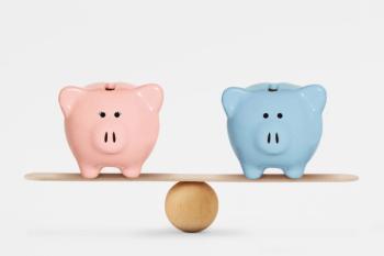 two piggy banks balancing 
