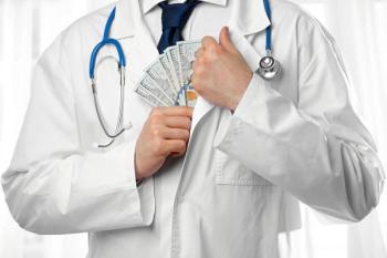 doctor putting money in coat pocket: © Africa Studio - stock.adobe.com