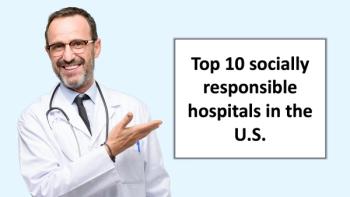doctor smiling and pointing 