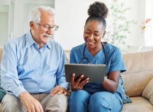 physician help patient directory tablet: © Lumos sp - stock.adobe.com