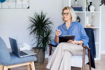 woman psychiatrist looking at laptop computer ©okrasiuk-stock.adobe.com