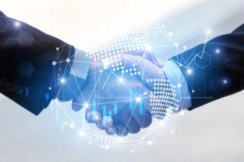 two business men shaking hands technology