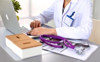 physician at computer © lenetsnikolai - stock.adobe.com