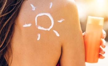 woman wearning sunscreen sun drawn on shoulder: © Art_Photo - stock.adobe.com