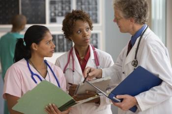 doctor with staff | © Blend Images - stock.adobe.com