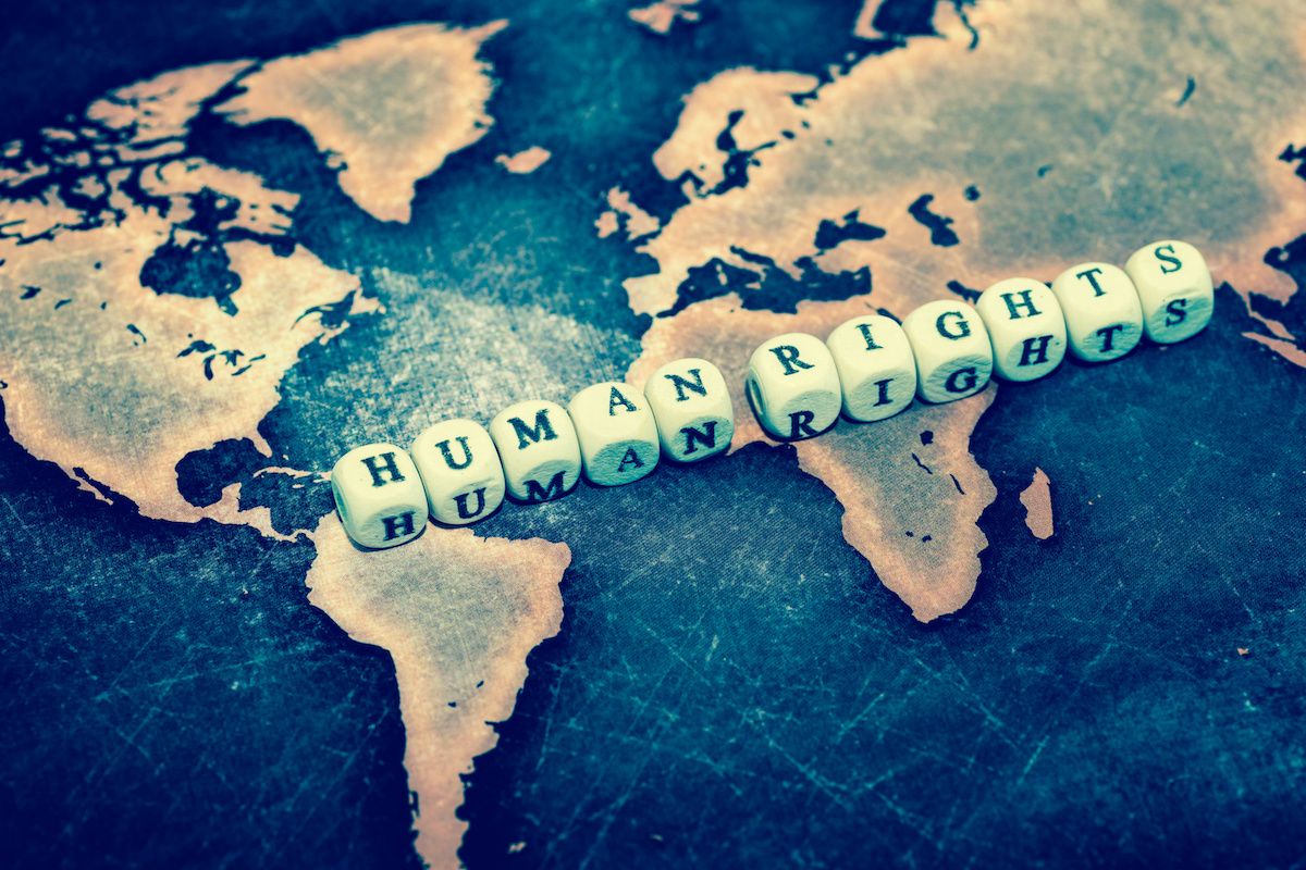 human rights word cubes on map: © Sean K - stock.adobe.com