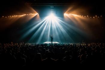 peson on stage | image credit: ©Jezper stock.adobe.com