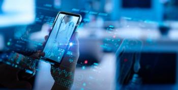 Hand holding smartphone | Image credit: greenbutterfly stock.adobe.com