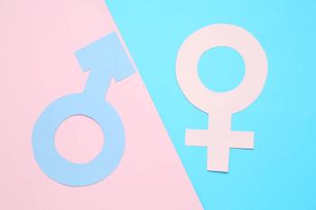 gender symbols on pink and light blue backgrounds | Imaged credit: ©new africa stock.adobe.come
