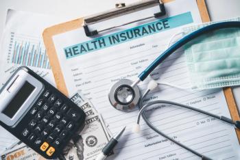 calculator. and stethoscope on top forms | Image credit: ©photobyphotoboy stock.adobe.com
