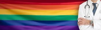 Doctor w LGBTQ rainbow flag | Image credit: © Syda Productions  stock.adobe.com