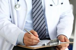 Doctor writing something