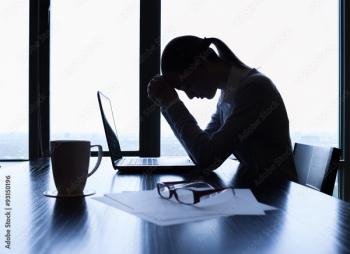 silhouette of stressed woman | image credit: ©kieferpix stock.adobe.com