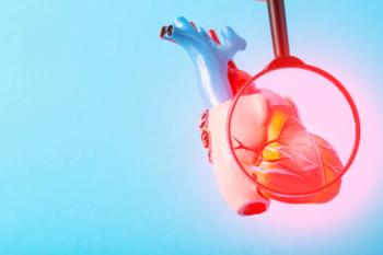 Medical mock-up of a heart under a magnifying glass on a blue background | image credit: @HEMADZY