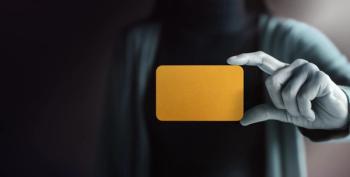 person holding a blank gold card | Image credit: ©blacksalmon stock.adobe.com