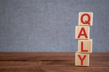 Qaly written on wooden blocks | image credit: ©anna stock.adobe.com
