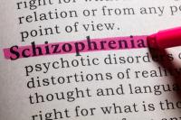 pink highlighter highlighting the word schizophrenia in the dictionary ©Feng Yu stock.adobe.com