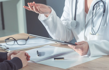 doctor advising patient