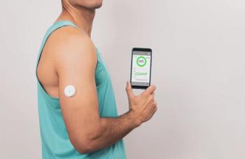 Man with continuous glucose monitor sensor in arm | Image credit: © Yistocking stock.adobe.com
