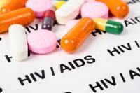 pills on writing in black that says HIV/AIDS  | ©gamja stock.adobe.com