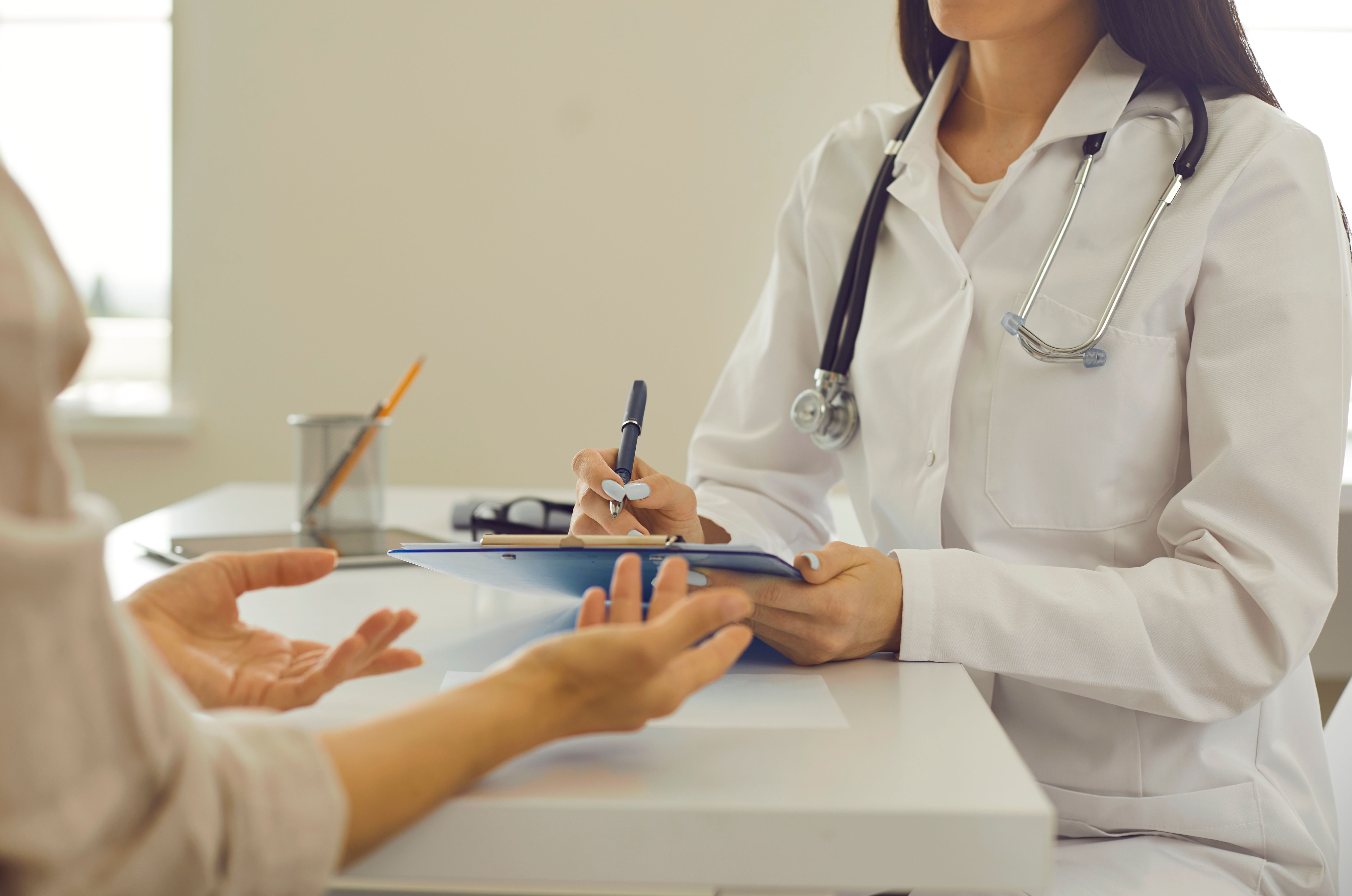 Woman healthcare professional talkng to a patient | Image credit: ©Studio Romantic stock.adobe.com