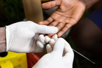 hiv test in uganda, hands in white gloves pricking a finger | ©Adam Ján Figeľ stock.adobe.com