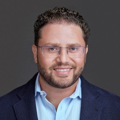 Reducing Health System Readmissions with AI