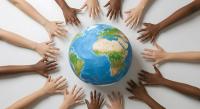 hands of different skin of color around a globe | ©Candra stock.adobe.com