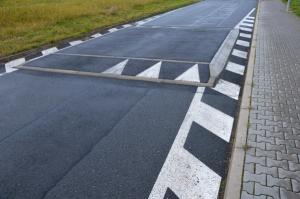 photo of a black-and-white speed bump | Image credit: © Michal stock.adobe.com