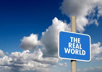 A sign that says real world, blue with white lettering | @Steve Ball stock.adobe.com