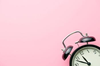 Clock on pink background | Image credit: ©Jiri Hera stock.adobe.com