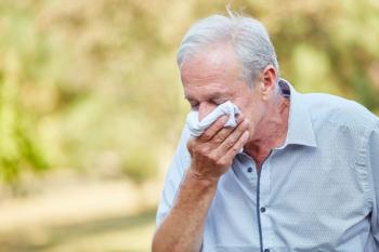 older man blowing into handkerchief | image credit: ©robert kneschke stock.adobe.com