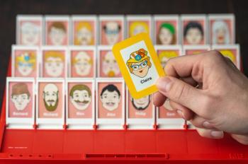 The popular game "Guess Who?" with cards flipped up to reveal dozens of faces. Concept image for EURETINA schedule and editorial advisory board member presentations. Image credit: ©Milos – stock.adobe.com