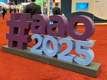 The AAO 2025 logo, in a large display on the American Academy of Ophthalmology exhibit hall floor. Photo credit: Sydney M. Crago