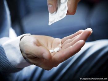 Man pills hand