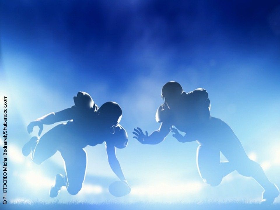 Football players head trauma brain injury