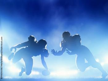 Football players head trauma brain injury
