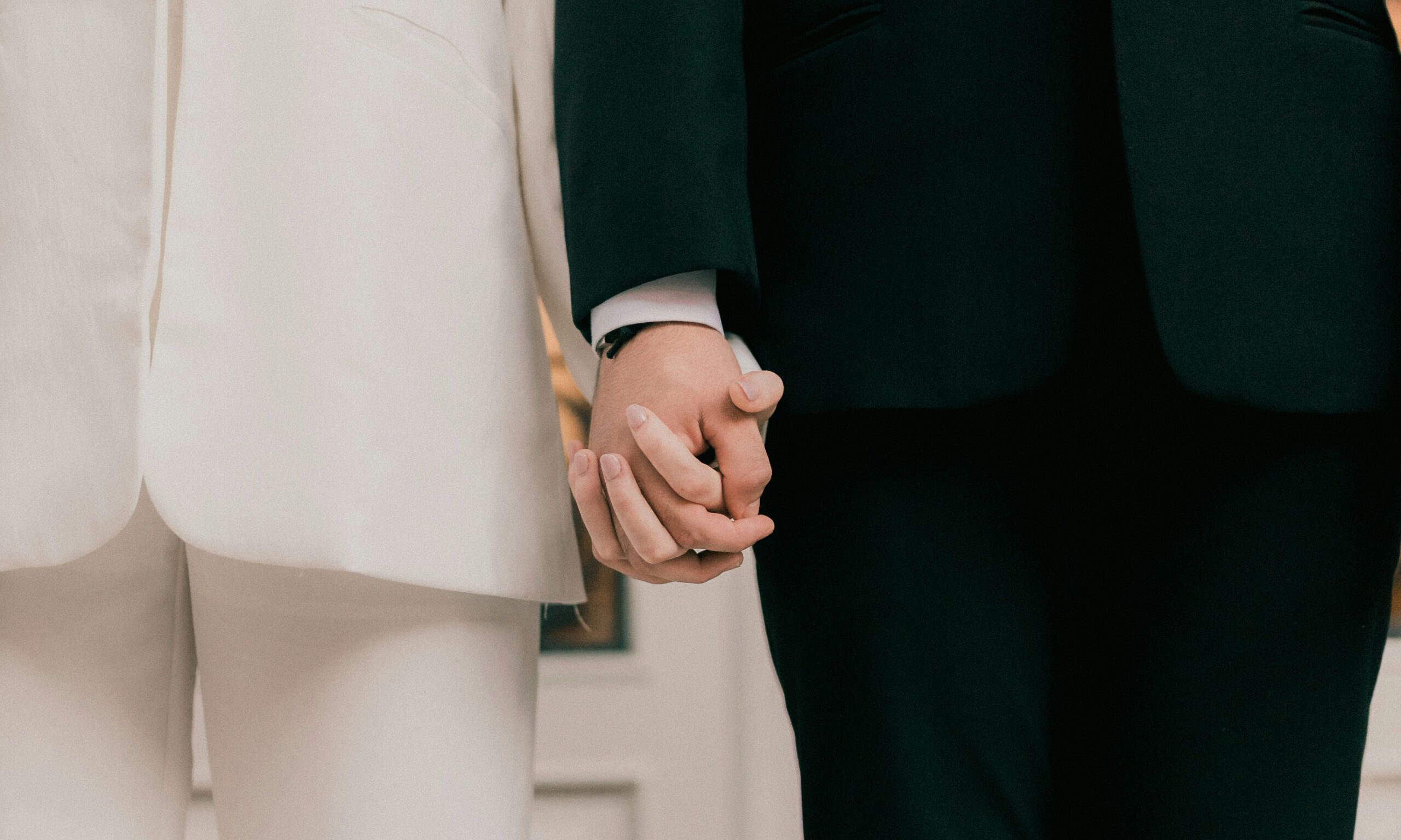 two people holding hands