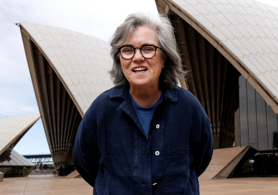 Rosie O’Donnell, who recently revealed she had a deep-plane facelift, poses in front of the Sydney Opera House.