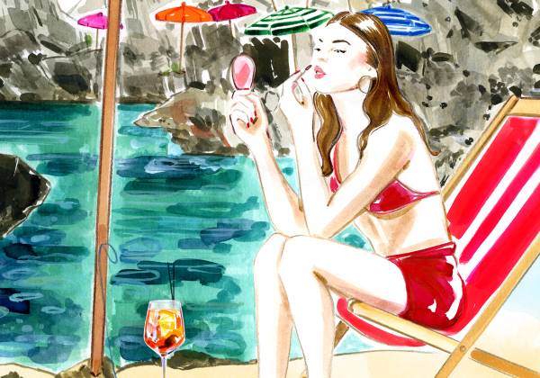 Watercolor illustration of a woman applying lip stain while sitting on a striped beach chair under colorful umbrellas by the water